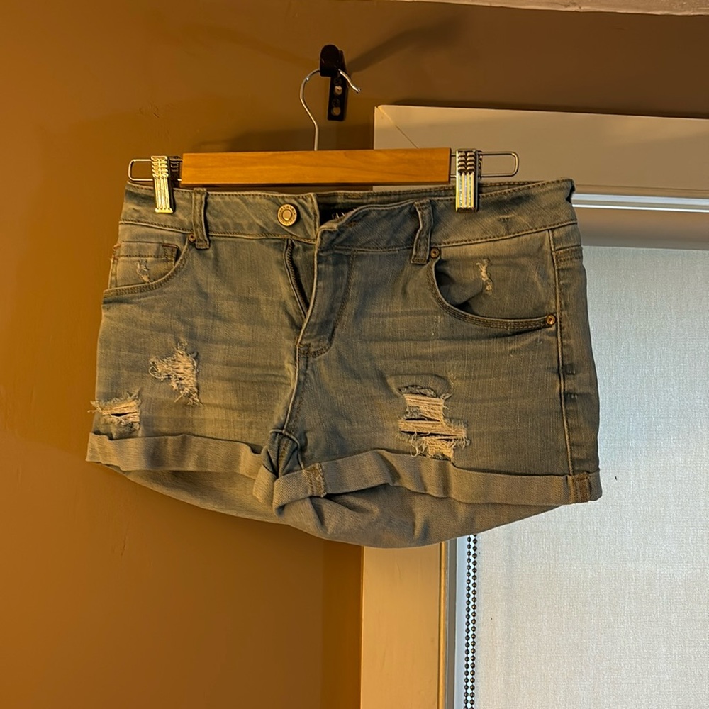 Women’s Wax Denim shorts.  Size M.  Distressed.